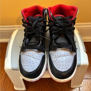 Kids Black and Red High-Top Jordan 1 Sneakers
